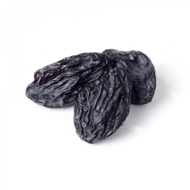 Tuğba Kuruyemiş dried black grapes with seeds, close-up of three large dark plump pieces