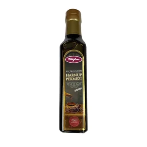 Tuğba Keçiboynuzu Harnup Pekmezi carob molasses in a dark glass bottle, 330g