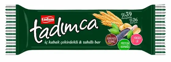 Tadımca pumpkin seed and grain bar in a dark green wrapper