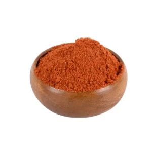 Ground hot red pepper powder in a wooden bowl – Malatya Pazarı Turkish spice