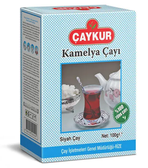 Çaykur Kamelya black tea 100 g box with a glass of Turkish tea on the package